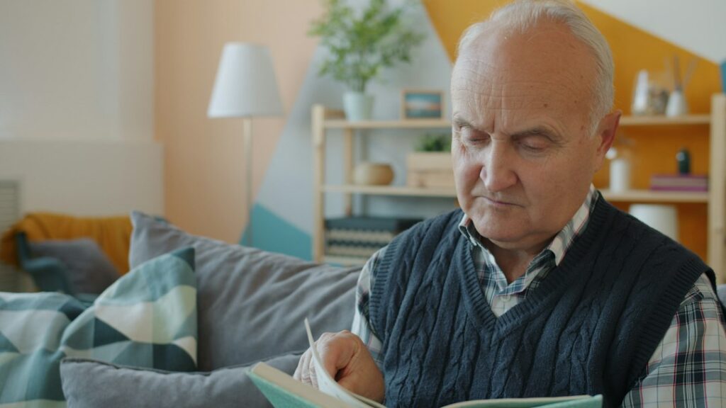 Senior man reading while seated comfortably at home - lift chair guide